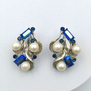 Vintage Pakula clip on blue rhinestone earrings with faux pearls